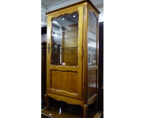 A French walnut display cabinet with glazed door, width 63cm.