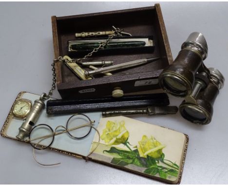 Box containing racing binoculars, gold wrist watch, penknives, dip pen, tools etc