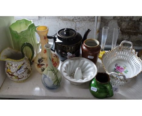 A teapot, jelly mold, jugs etc