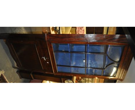 A Georgian mahogany 2-section corner cabinet, with a lattice glazed panel door to the top, base fitted with drawer and panel 