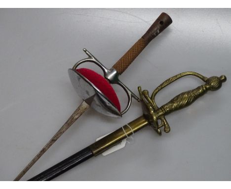 A sword in brass mounted leather scabbard and a fencing foil