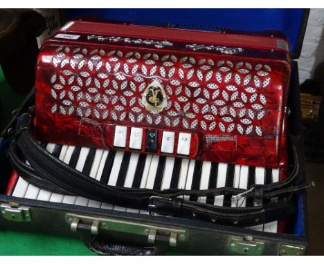 A Paolo Soprani piano accordion in case