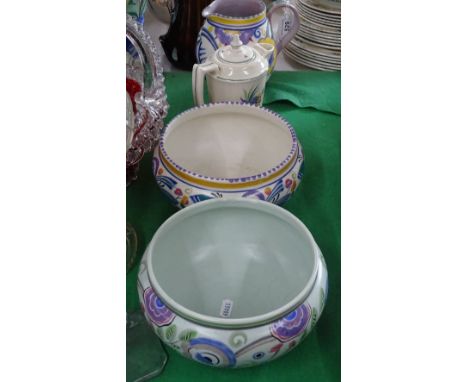 A Poole Pottery jug with bird and floral design, 2 fruit bowls and a jug