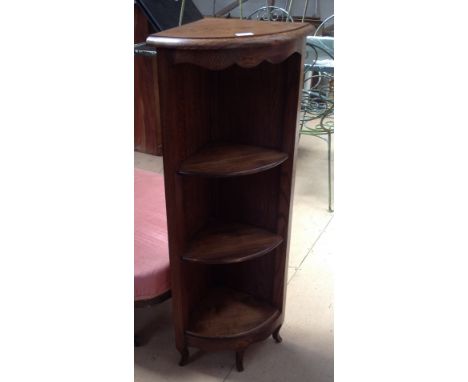 A French oak floor standing corner display cabinet with open shelves