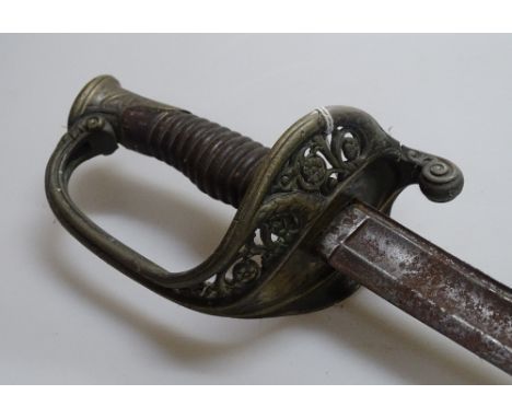 A 19th century Army Officer's sword, cast pierced brass hilt with wooden grips
