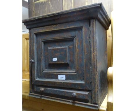 A small Antique painted pine table top cabinet, the panel door revealing shelves with drawer under, width 43 cm