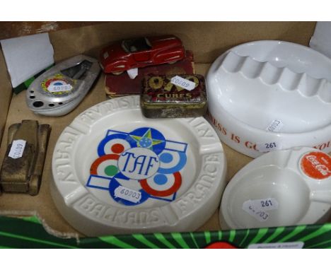 A cribbage board, advertising ashtrays etc