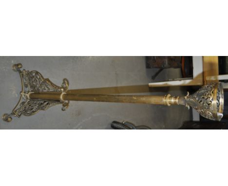 An Antique brass Corinthian column oil lamp stand, floor standing with floral pierced mounts, height 124 cm