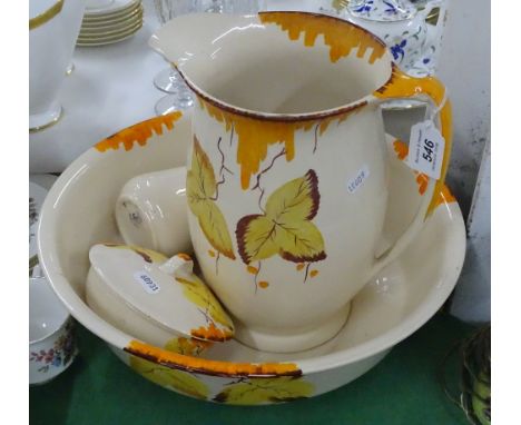 An Art Deco wash jug and basin set