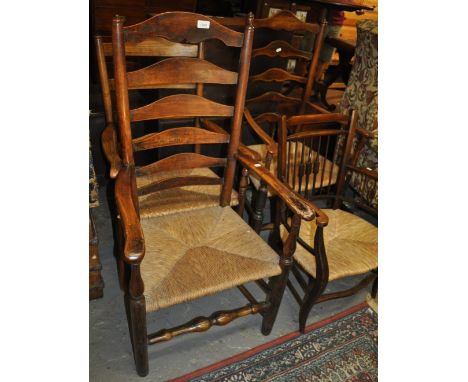 3 similar 19th century oak ladder back elbow chairs and a similar (4)