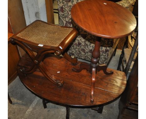 An oak drop leaf coffee table, mahogany tripod table and an x-framed cane seated stool (3)