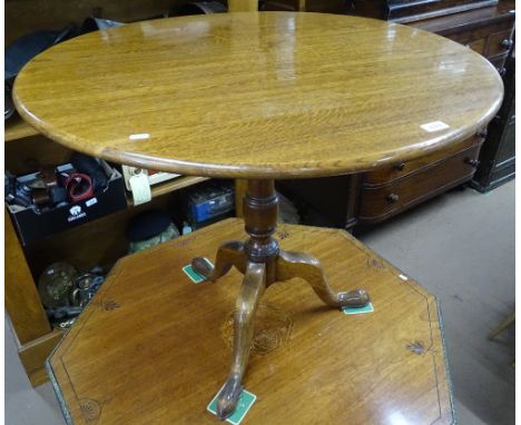A Georgian style oak tilt-top tripod table, width 90 cm