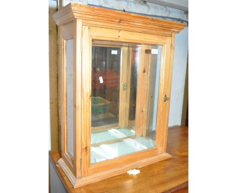 A pine-framed table top display cabinet, 57 cm