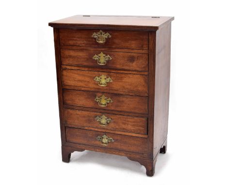 George III mahogany commode chest of drawers, the hinged top inlaid with ebony and boxwood banding opening to reveal a later 
