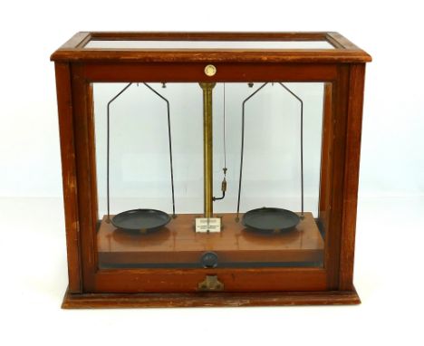Antique brass laboratory scales marked 'W &amp; J George &amp; Becker', set within a Griffin &amp; Tatlock glazed mahogany ca