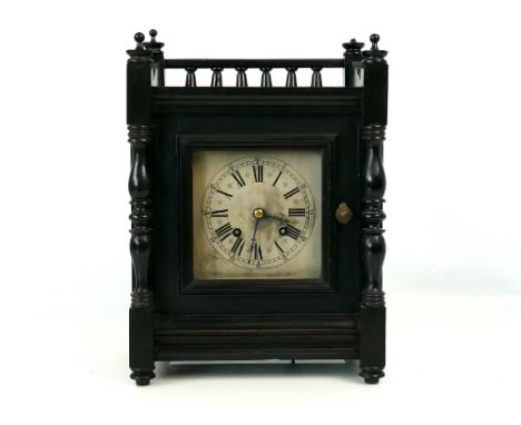 Late 19th century Aesthetic Movement ebonised wood chiming mantel clock, twin train movement, silvered dial with Roman numera