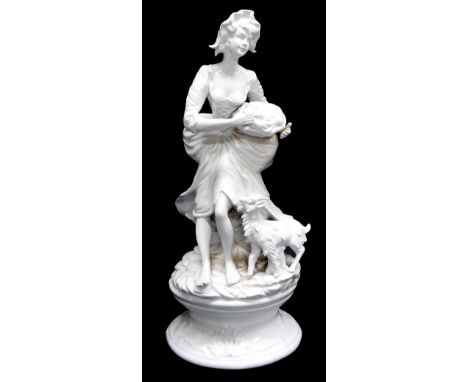 Large blanc de chine style white glazed porcelain figure of a Shepherdess with basket of fruit, a sheep by her feet, modelled
