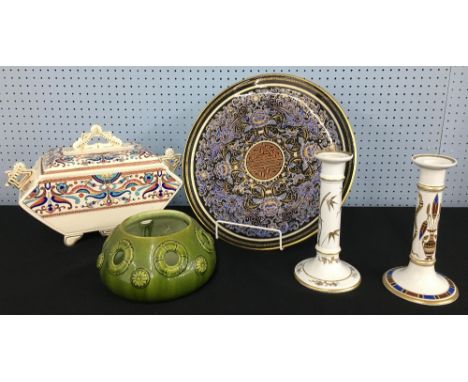 Royal Worcester porcelain charger, decorated with phoenix and stylised blue foliage on a black ground within a gilded key bor