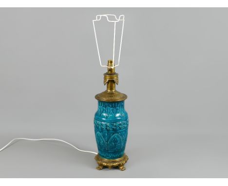 An impressive vintage teal blue/green glazed decorative ceramic and brass table lamp upon a heavy ornate brass footed base, 1