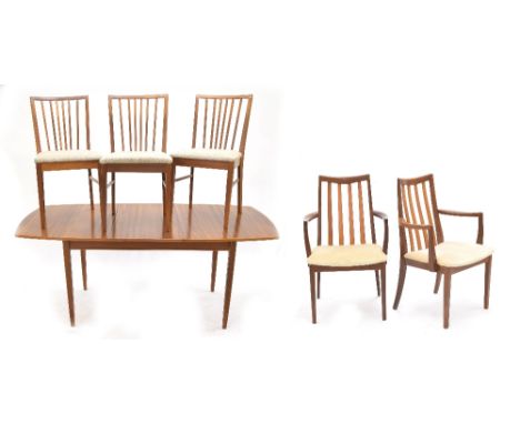Peter Hayward for Vanson mid century extending dining table and three stick back dining chairs; together with a pair of G Pla