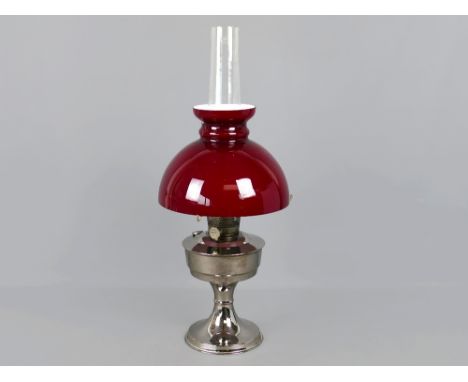 Alladin oil lamp, no. 23, with original ruby red glass shade and chimney, 24" tall