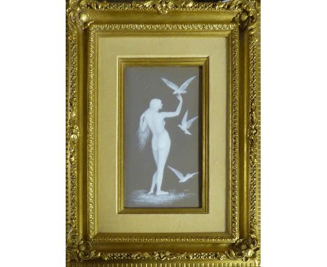 'Doves Landing on a Lady's Hand', ceramic, initialled 'M.B.', 26cm x 14.5cm, framed. 