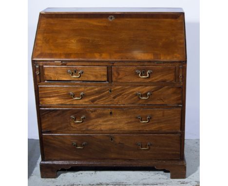 Victorian mahogany bureau, fall front with broad crossbanding enclosing interior, fitted with drawers, pigeon-holes and cupbo