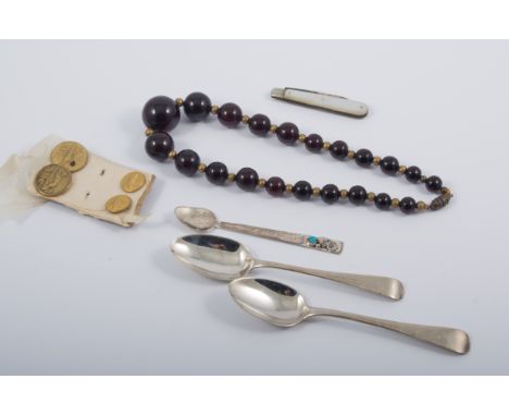 A jewel box containing brass buttons, a silver fruit knife, beads, earrings, oval locket, a barometer wheel, six silver teasp
