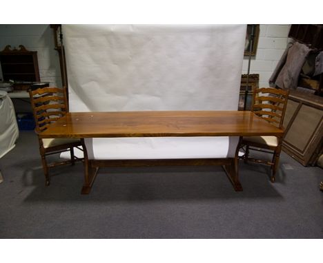 Reproduction oak dining table, rectangular boarded top, tressle base, length 245cm; and a set of six beech Lancashire style l