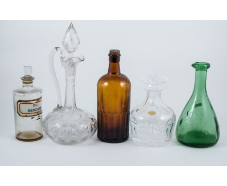 Victorian cut glass decanter with stopper, 24cm, other decanters, two chemist's jars and a poison bottle. (11)
