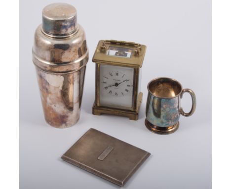 Brass carriage clock, silver cigarette case, plateware.