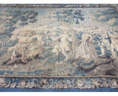 A large 17th Century Brussels type Verdure Tapestry with dancing figures and musicians in a landscape, 8ft x 13ft 6in, in ver