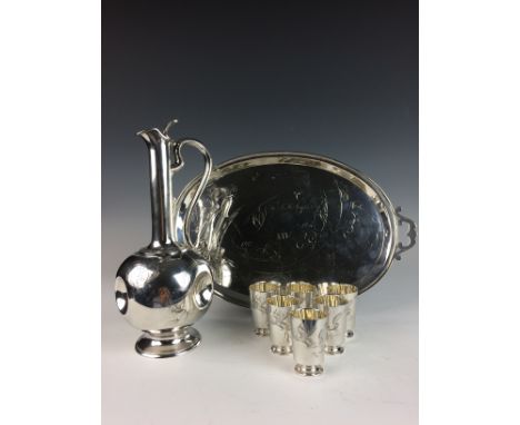 An early 20th Century Russian silver Vodka Service comprising a dimpled globe and shaft Decanter and a set of six matching Vo