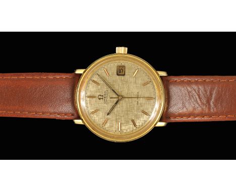A 1960's Gentleman's Omega De Ville Automatic Wristwatch the gold textured dial with applied baton markers, sweep seconds han