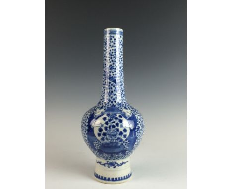 A Chinese blue and white porcelain Bottle VaseSix-character Kangxi mark, 19th CenturyPainted with the 'HeHe Erxian' (laughing