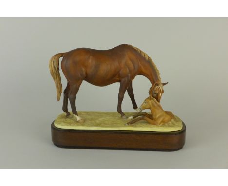 A Royal Worcester Model "The New Born", modelled by Doris Lindner, Limited Edition, No. 212, on wooden base, 10in L