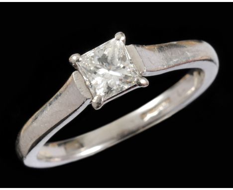 A Diamond single stone Ring claw-set princess-cut stone in platinum, ring size K