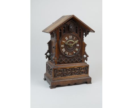 A 19th Century Gothic Cuckoo Table Clock attributed to Johann Beha retailed by Hoeber, Duke Street, Grosvenor Square, London,