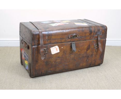 A leather Travelling Trunk with leather handles, leather fitted interior within top, brass lock, with old labels, 2ft 10in W 