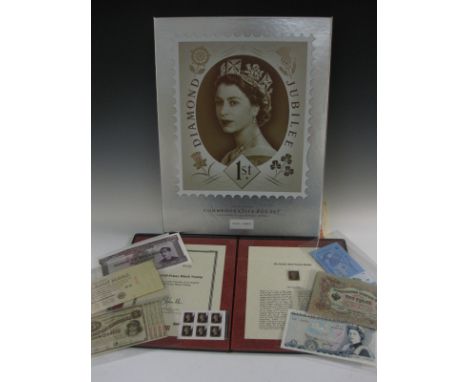 A Collection of British and World Banknotes, Stamps and Share Certificates.  Banknotes including Page £5 prefix "435", 1866 S