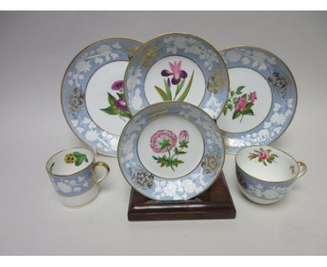 An early 19th Century Spode Tea and Coffee Service floral painted with white floral moulding on a pale blue ground, gilt deta