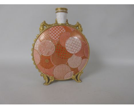 A Royal Worcester Moon Vase with geometric circular orange pattern designs, two gilt handles, on scroll moulded feet, 11in H