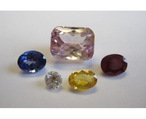 Five loose Gem Stones including brilliant-cut diamond, oval-cut tanzanite, oval-cut ruby, oval-cut yellow sapphire and cushio