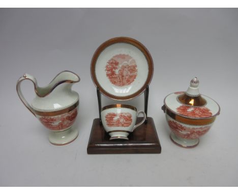 An early 19th Century Shorthose & Co part Tea Service with iron red transfer printed cartouches of rural landscapes with figu