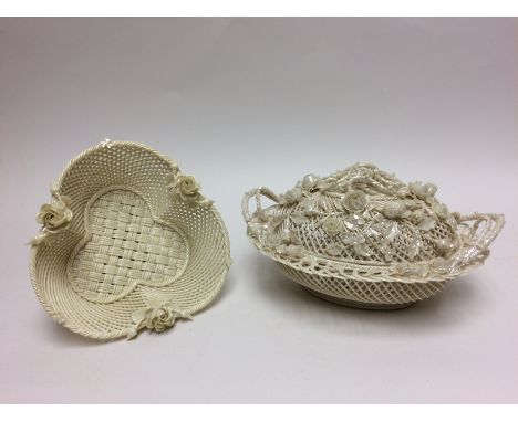 A Belleek trefoil porcelain Basket and a Belleek type oval porcelain Basket and Cover, the first applied with roses and shamr