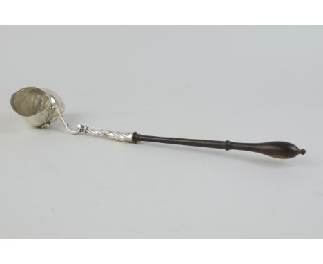 A rare George II silver Toddy Ladle in the form of a nautilus shell with turned wooden handle, London 1747, 14in L