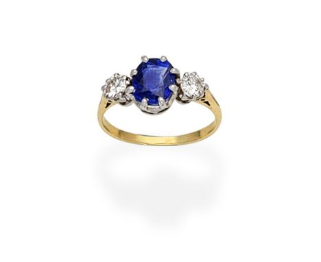 SAPPHIRE AND DIAMOND RINGCentrally-set with a cushion-shaped sapphire, between two brilliant-cut diamonds, ring size approx. 