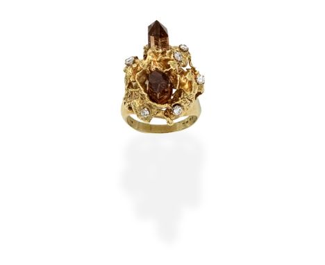 TOPAZ CRYSTAL AND DIAMOND DRESS RING, 1969The two pink topaz crystals within an abstract 18 carat gold mount, accented with b