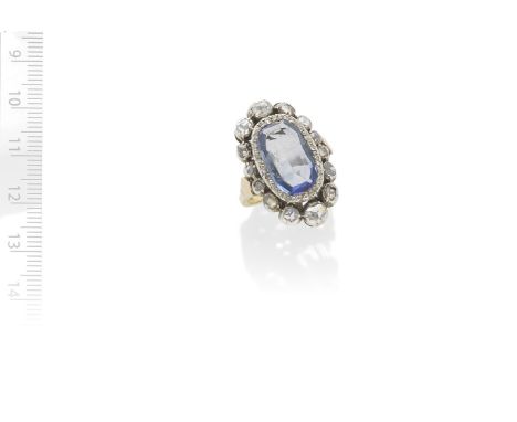 SAPPHIRE AND DIAMOND CLUSTER RING, 19TH CENTURY AND LATERThe central cushion-shaped sapphire within borders of rose and table