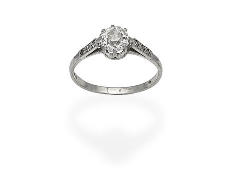 DIAMOND SINGLE-STONE RINGSet with a cushion-shaped diamond, between similarly set diamond shoulders, principal diamond approx